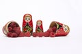 Wooden doll`s Matreshka Babushka with raspberries