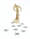 Wooden doll uploaded to chair with spider phobia Royalty Free Stock Photo