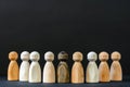 Wooden Dolls Standing Together in Group. Generative AI.