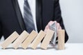 Wooden domino, business strategy, risk, money, balance concept Royalty Free Stock Photo