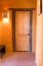 Wooden door in an adobe home Royalty Free Stock Photo