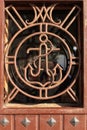 Wooden door with anchor detail in wrought iron Royalty Free Stock Photo