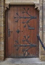 Wooden door with archway and steps Royalty Free Stock Photo