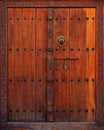 Wooden Door with Carved Frame Royalty Free Stock Photo