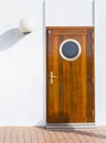 Wooden door with a on a cruise ship Royalty Free Stock Photo