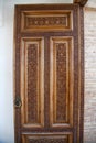A wooden door decorated with carvings in the Khast Imam complex in Tashkent, Uzbekistan. Craft, Art. Apr 29.2019