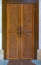 Wooden door decorated by tradional thai ornament Royalty Free Stock Photo