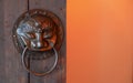 Wooden door detail with lion door knockers close up, Asia. Chinese style architecture of temple . Royalty Free Stock Photo