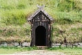 Wooden door entrance to the Icelanding turf house