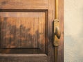 Wooden door handle shade shadow lighting Royalty Free Stock Photo