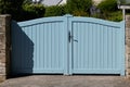 Wooden door high blue clear grey gate of house wood portal gray of suburb access home Royalty Free Stock Photo