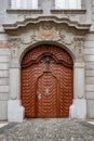 Wooden door of a historic burgher house in the center of Prague