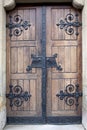 Wooden door with iron details Royalty Free Stock Photo