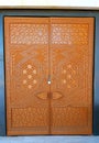 Wooden door with islamic geometry lines on it