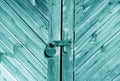 Wooden door with lock in cyan tone Royalty Free Stock Photo