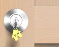 Wooden door with lock and house shape key-ring Royalty Free Stock Photo