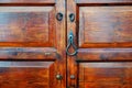 Wooden door with lock and knocker