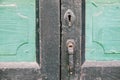 Wooden door with lock and knocker