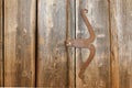 Wooden door made of barn wood with rustic vintage handle