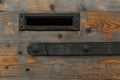 Wooden door with mail slot