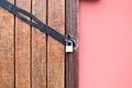 Wooden door with metal padlock Royalty Free Stock Photo