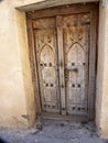 Wooden door of old houses, hamlet in mountains, Oman Royalty Free Stock Photo