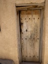 Wooden door of old houses, hamlet in mountains, Oman Royalty Free Stock Photo