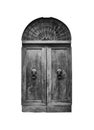Wooden door in an old Italian house, isolated on white background, clipping path. Royalty Free Stock Photo