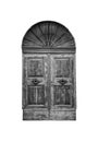 Wooden door in an old Italian house, isolated on white background, clipping path. Royalty Free Stock Photo