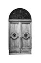 Wooden door in an old Italian house, isolated on white background, clipping path. Royalty Free Stock Photo