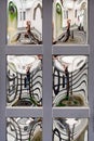 A wooden door panel with curved mirrored glass inserts Royalty Free Stock Photo