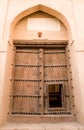 Wooden door of Rustaq fort Royalty Free Stock Photo