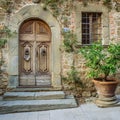 Wooden door in a small village of medieval origin. Volpaia, Tuscany, Italy Royalty Free Stock Photo