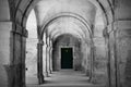 Wooden door and stone arches