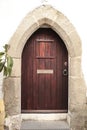 Wooden door and stone threshold in Elvas town Royalty Free Stock Photo