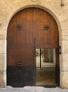 Wooden door in stone wall in Mallorca, Spain Royalty Free Stock Photo