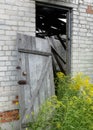 A wooden door, taken from its hinges