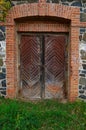 Wooden door to an abandoned old building Royalty Free Stock Photo