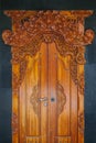 Wooden doors with Balinese designs and ornaments Royalty Free Stock Photo