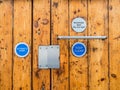 A wooden doors entrance secured and locked using an automatic system fob key.