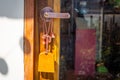Wooden doors with glass hanging, Japanese wooden signs in front of the cafe.