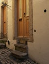 Wooden Doors With Stone Stoops In Lisbon Portugal