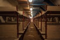 Wooden double-decker beds inside old abandoned soviet bomb shelter