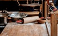 Dough rolling pin and flour on table at Christmas fair Royalty Free Stock Photo