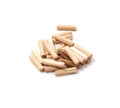 Wooden dowel for assembling furniture on a white background, isolate, close-up