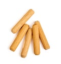 Wooden dowels on white