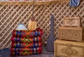 Wooden dowry chest near some asian carpets