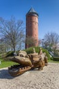 Wooden dragon sculpture in front of the water tower in Grimmen