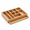 Wooden drawer organizer made from bamboo featuring multiple compartments Royalty Free Stock Photo
