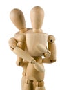 Wooden dumies hug Royalty Free Stock Photo